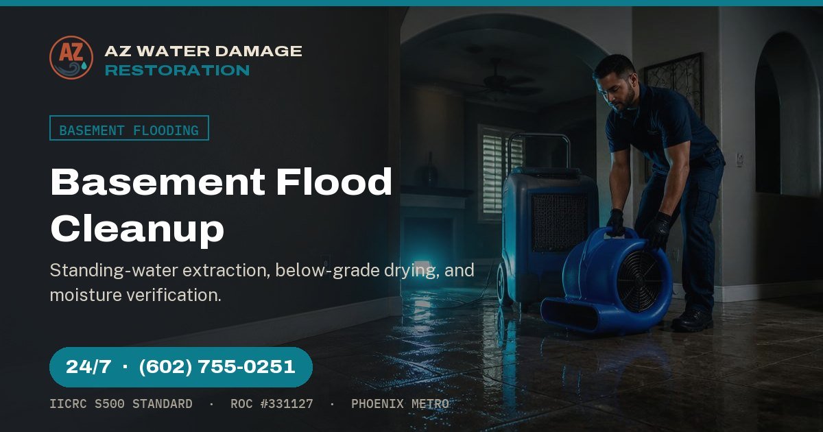 Emergency water restoration crew extracting water and drying a flooded residential basement with industrial air movers and dehumidifiers